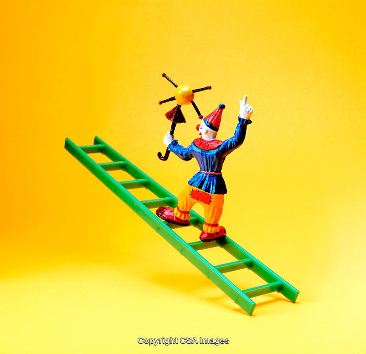 Colorful Clown Toy on Ladder Against Bright Yellow Background