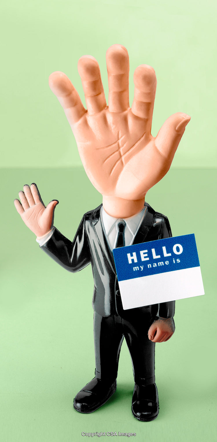 Humorous Figurine With Hand Face and Business Attire on a Green Background