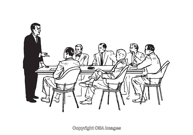 Team in Meeting Listening to Presenter in Professional Setting