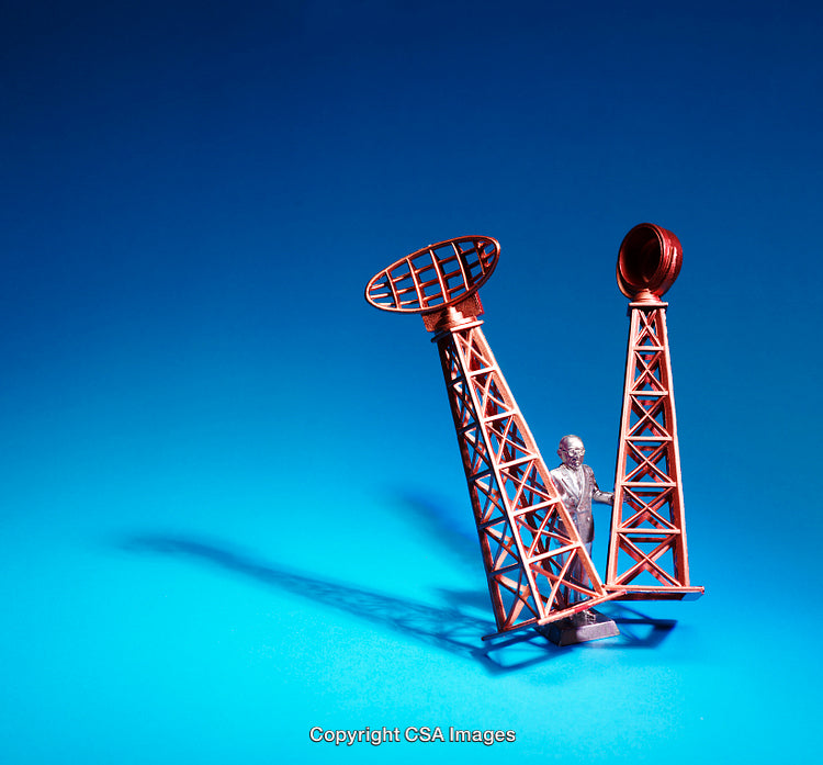 Miniature Antennas and Figure on Bright Blue Background