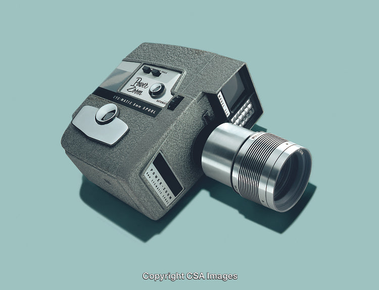 Vintage Film Camera on Turquoise Background with Retro Design Elements