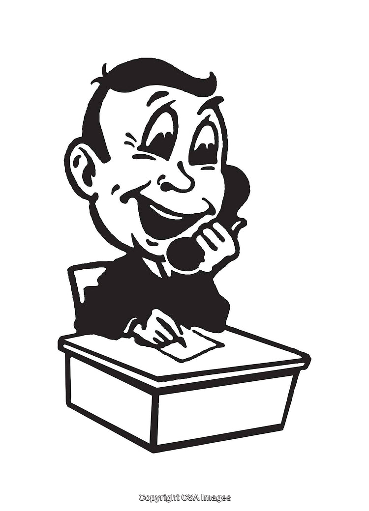 Smiling Businessman Making a Phone Call at His Desk