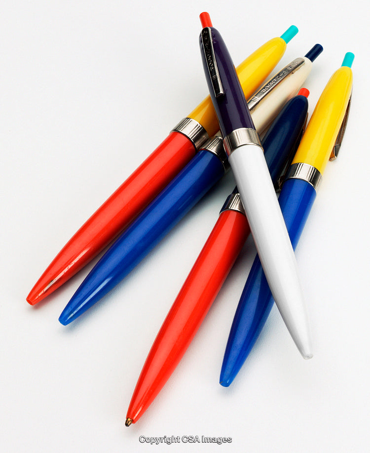 Colorful Assortment of Ballpoint Pens Arranged Against a White Background