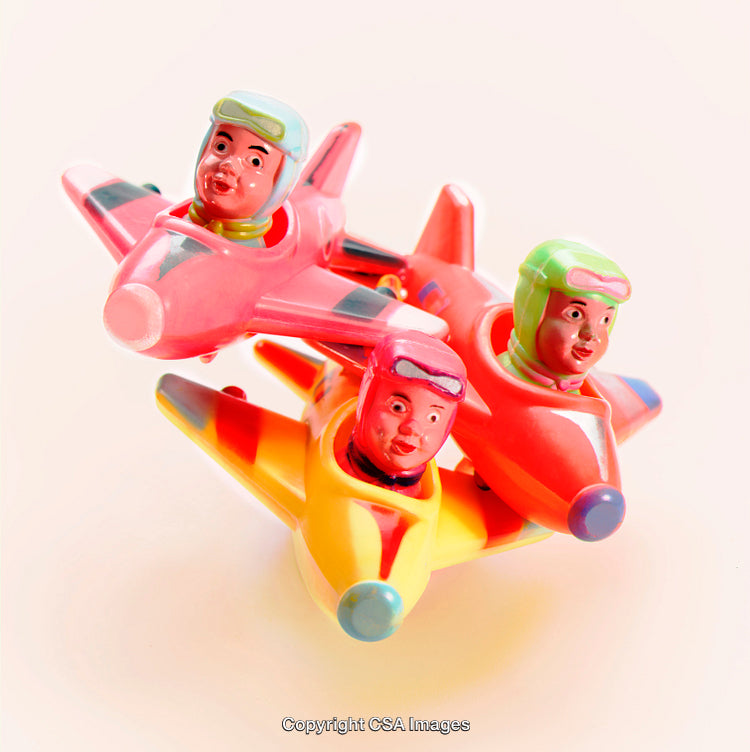 Colorful Vintage Toy Airplanes with Pilot Figures in Bright Colors