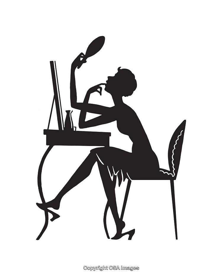 Elegant Silhouette of a Woman Applying Makeup at a Vanity Table