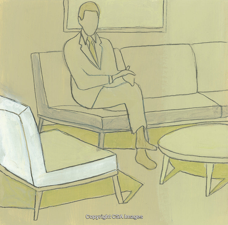 Man Sitting in Living Room