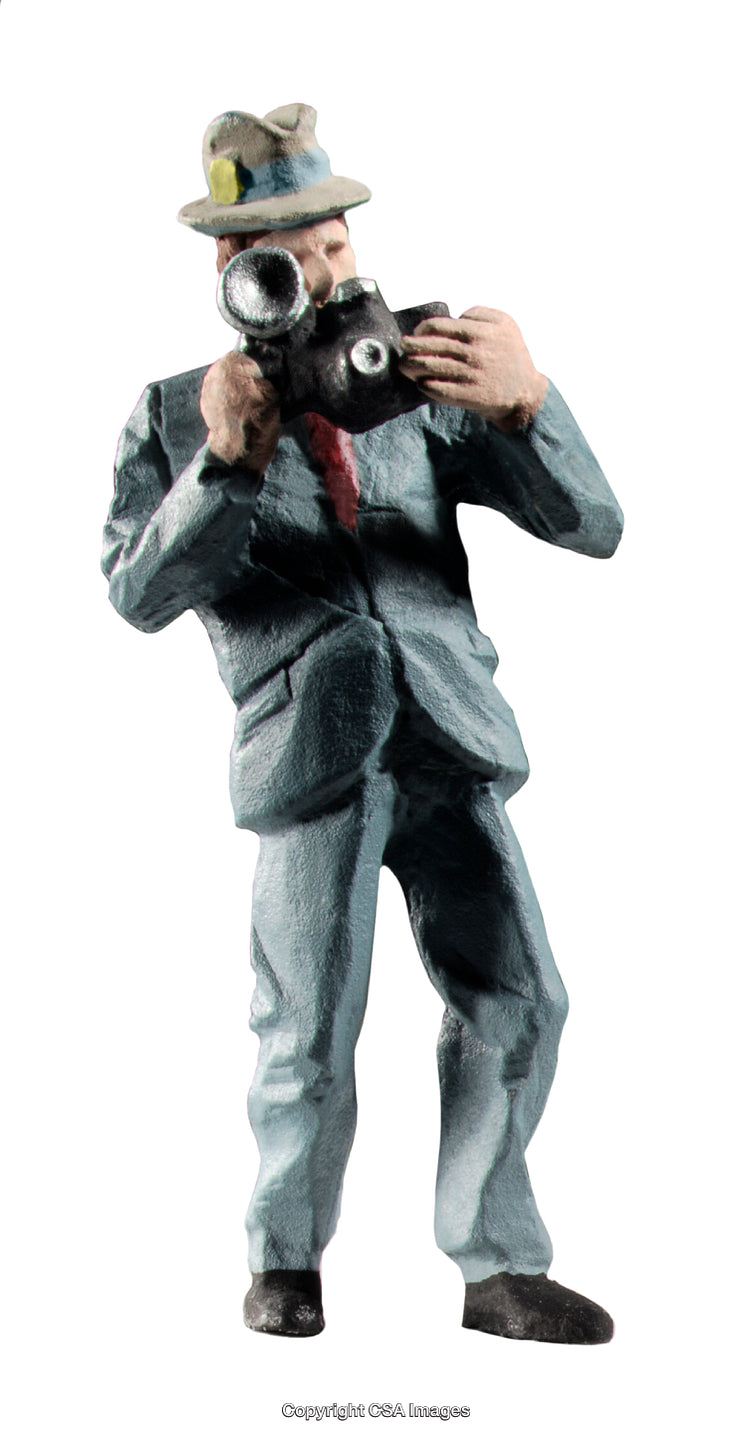 Vintage Toy Figure of a Photographer Holding a Camera in Action Pose