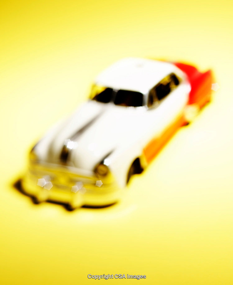 Abstract Artistic Depiction of Retro Car Toy with Blurred Effect
