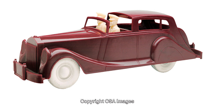 Vintage Plastic Toy Car with Detailed Classic Design and Figures in Interior