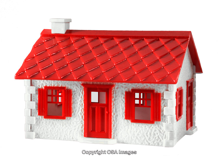 Small Plastic Toy House with Red Roof and White Walls