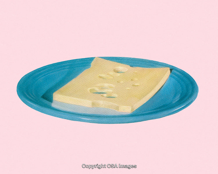 Artistic Photo of a Cheese Slice on Blue Plate Against Pink Background