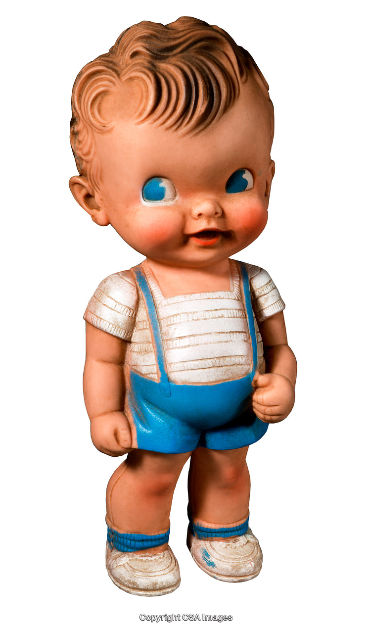 Vintage Boy Figurine with Blue Outfit and Cheerful Expression