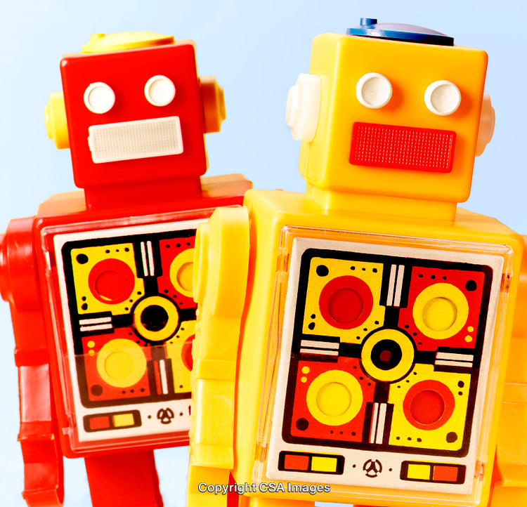 Retro Red and Yellow Plastic Robot Figures With Bright Colors and Patterns