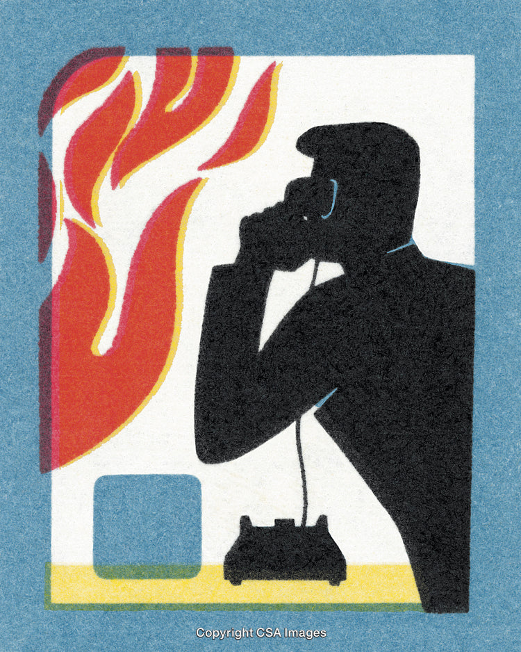 Silhouette Of A Person Making An Emergency Call Near Flames