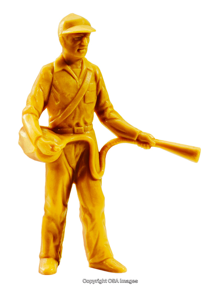 Close-Up of a Yellow Plastic Toy Soldier Figure Isolated on White