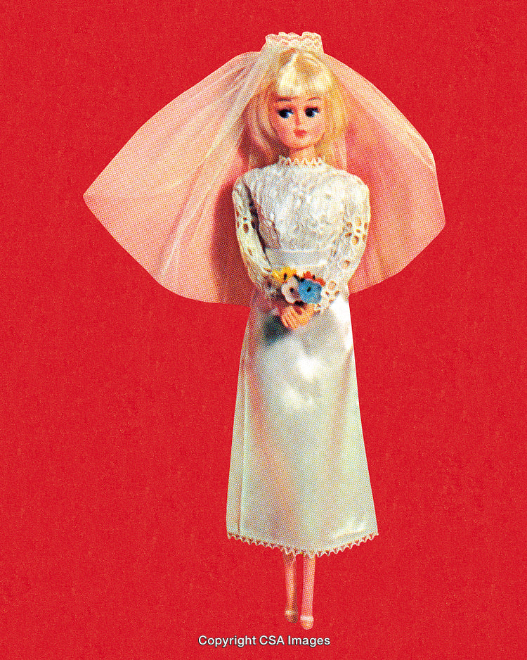 Bride Doll in Wedding Dress on Bold Red Background