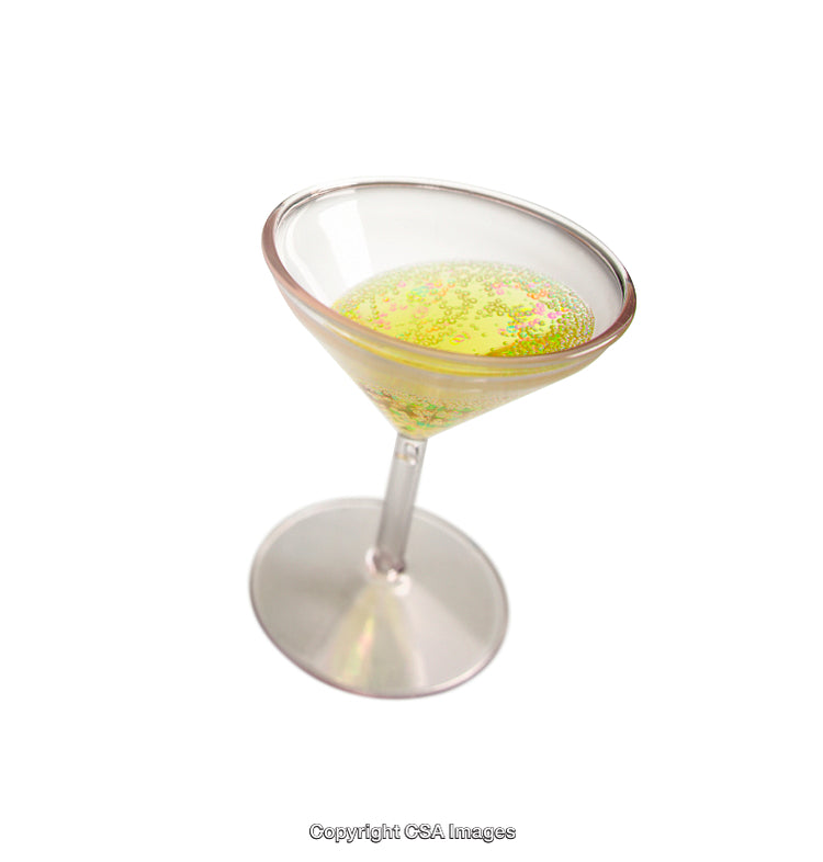 Colorful Liquid in Transparent Toy Cocktail Glass Isolated on White Background
