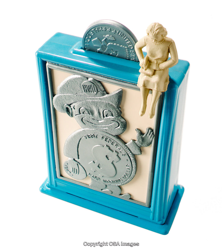Vintage Plastic Coin Bank Featuring Whimsical Designs in Blue and Silver