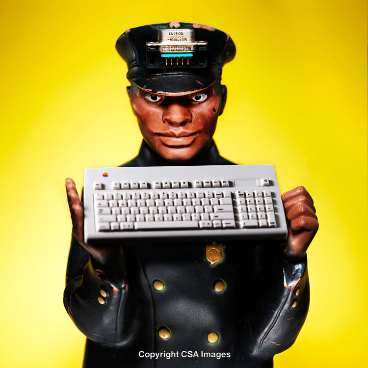 Figurine Holding Keyboard in Front of Bright Yellow Background