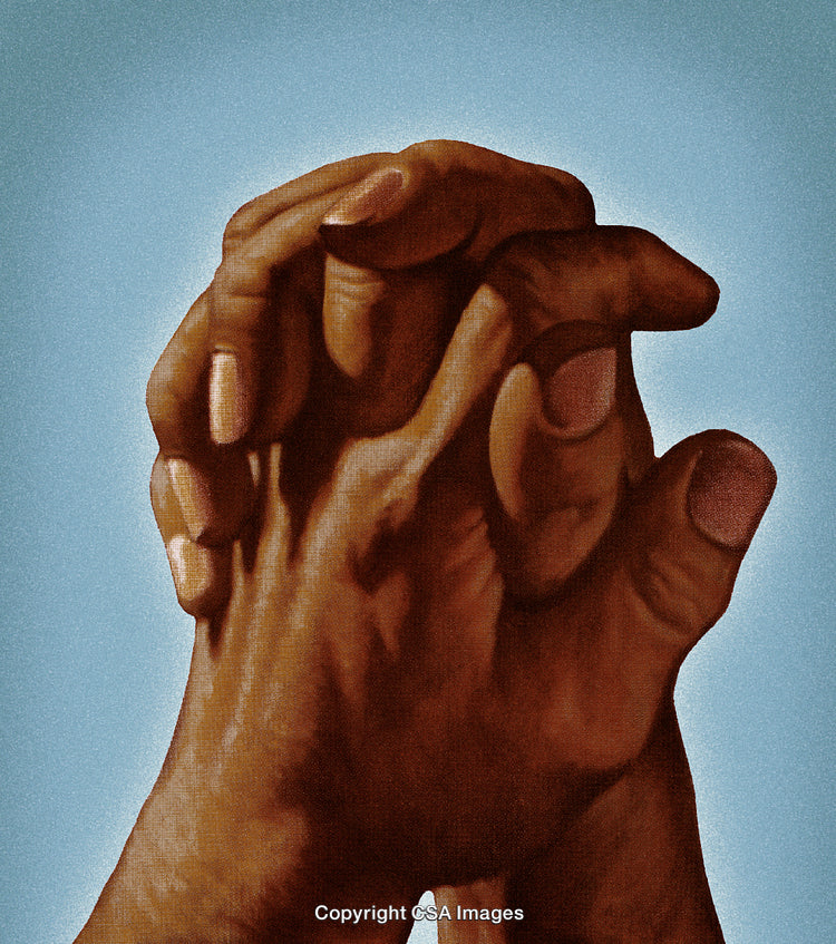 Close-Up of Intertwined Hands in Prayer Against a Light Blue Background