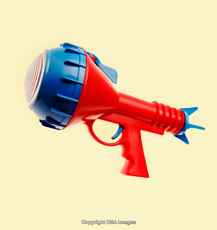 Red and Blue Toy Ray Gun Isolated on a Yellow Background