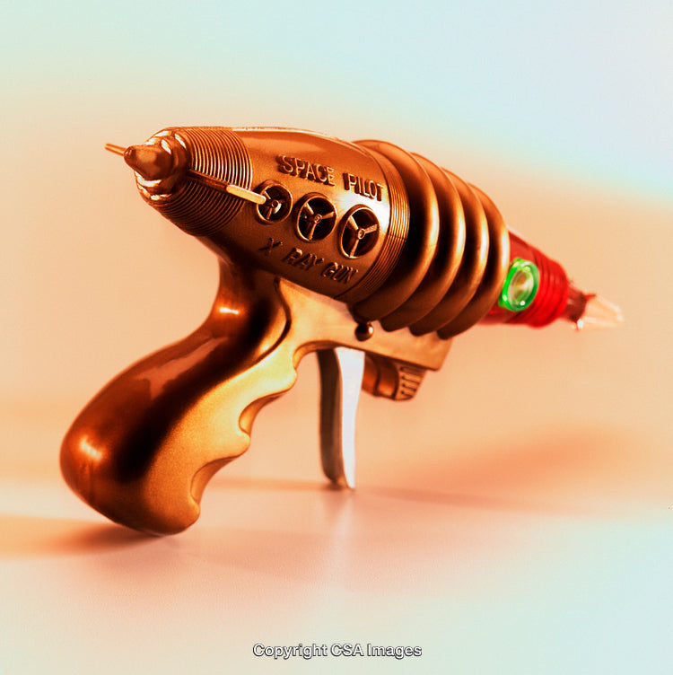 Vintage Retro Styled Toy Ray Gun with Golden Finish and Spiral Design