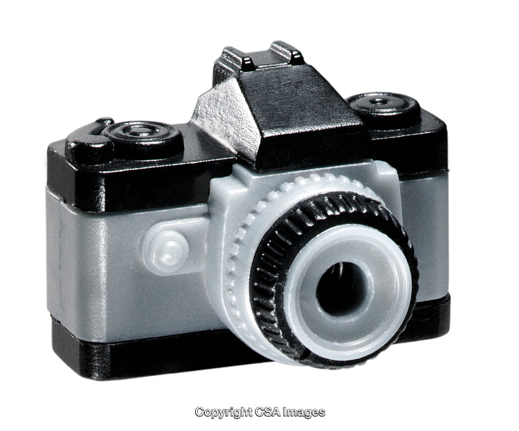 Close-Up of a Black and Gray Plastic Toy Camera on White Background