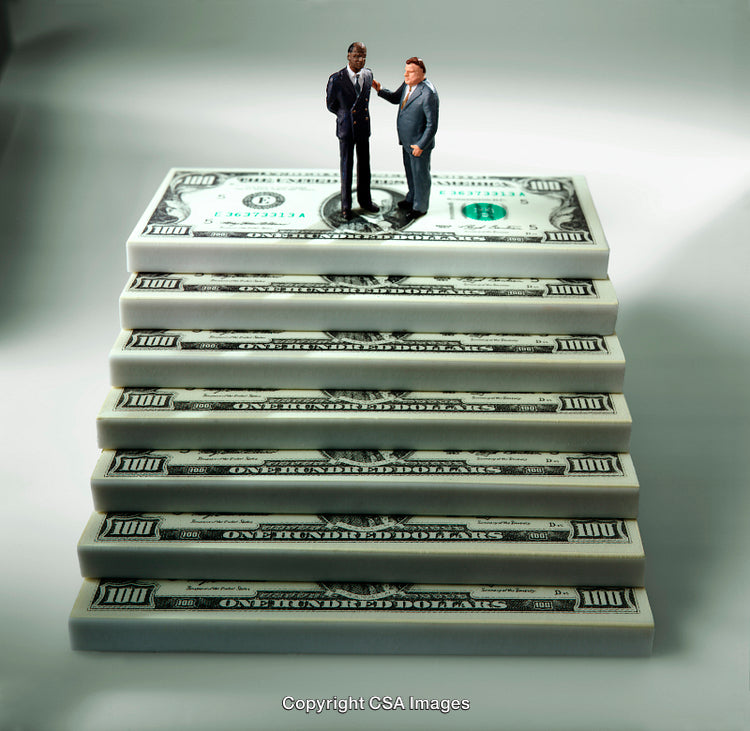 Miniature Figures on Staircase of Stacked Cash Representing Wealth or Success