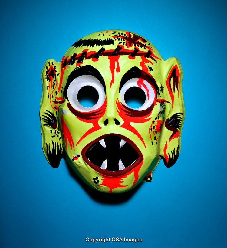 Colorful Monster Mask on Vibrant Background for Halloween Celebrations