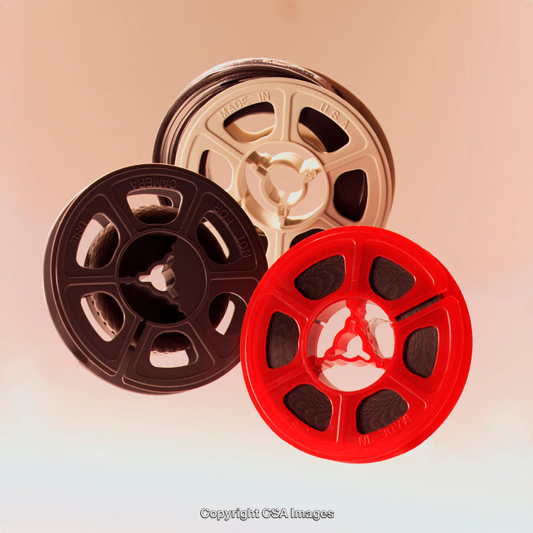 Colorful Plastic Reels Against a Neutral Background