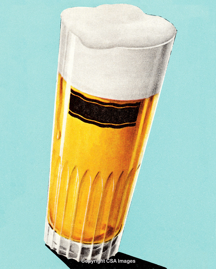 Tall Glass of Beer Against Light Blue Background with Foam on Top