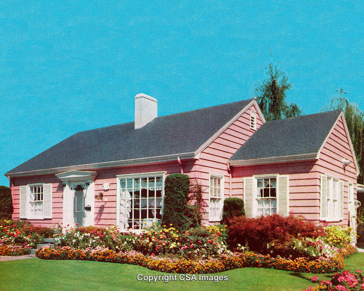 Charming Pink Suburban House with Vibrant Garden Under Clear Blue Sky