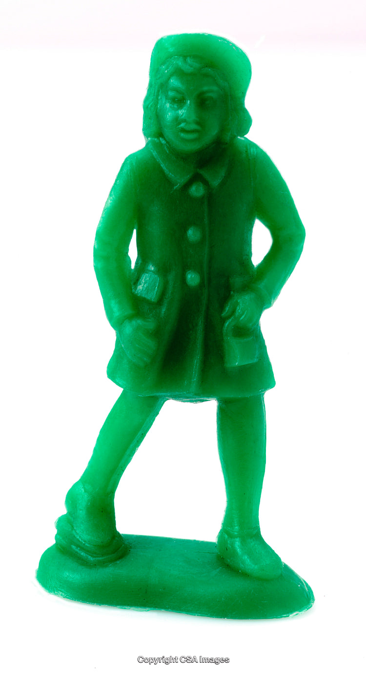 Close-Up of a Vintage Green Plastic Figurine