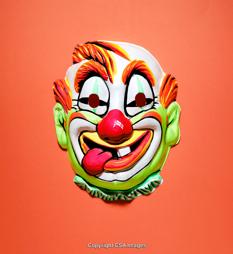 Colorful Clown Mask on Vibrant Orange Background