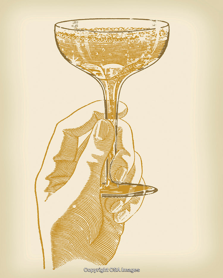 Hand Holding a Glass of Champagne