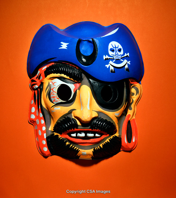 Vivid Pirate Mask Against Bright Orange Background Symbolizing Adventure and Halloween