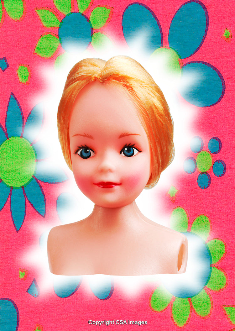 Close-Up of a Blonde Toy Doll Head on a Colorful Floral Background