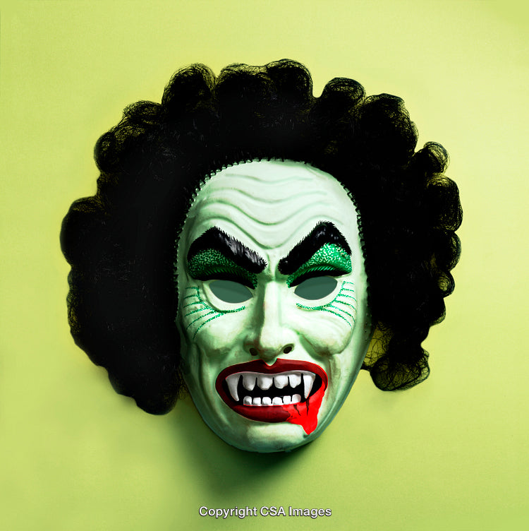 Green Monster Mask with Curly Hair and Dramatic Expressions