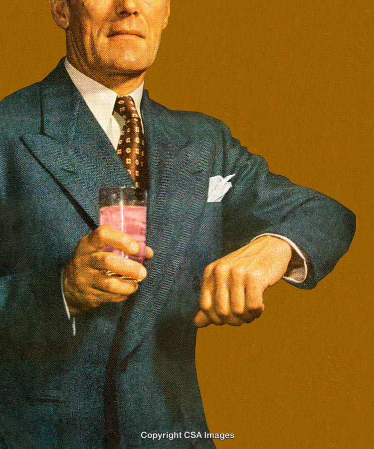 Man in Formal Suit Holding Drink Against a Bold Colored Background