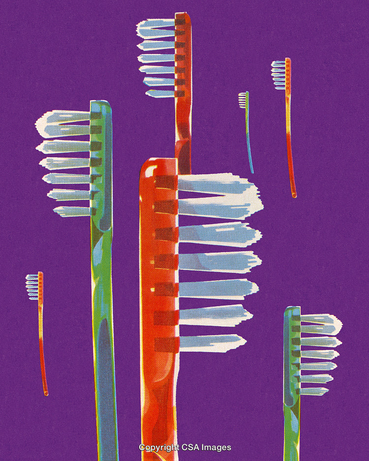Colorful Toothbrushes Arranged on a Vibrant Purple Background