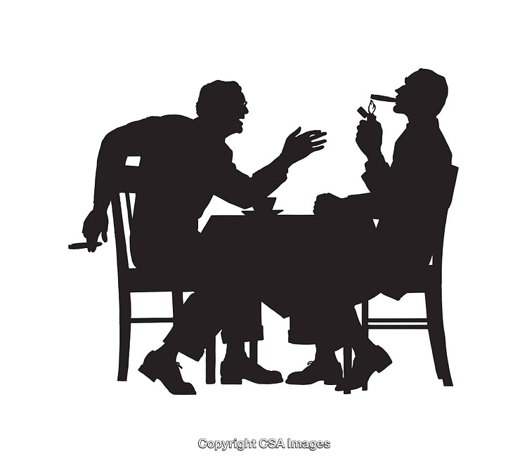 Silhouette Discussion Between Two Men in a Relaxed Setting