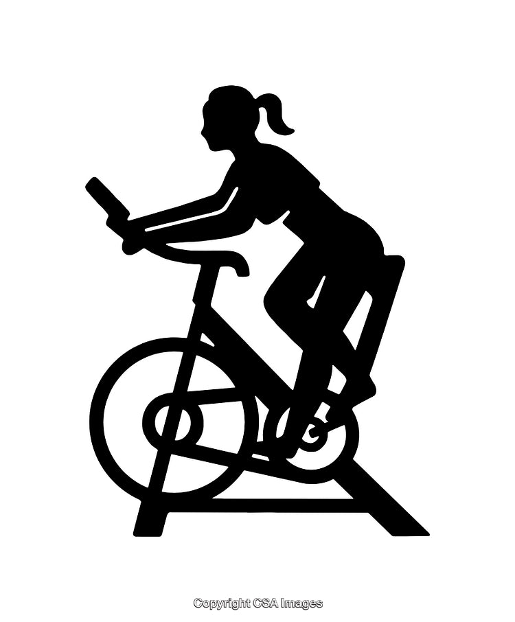 Silhouette of a Woman Exercising on a Stationary Bicycle