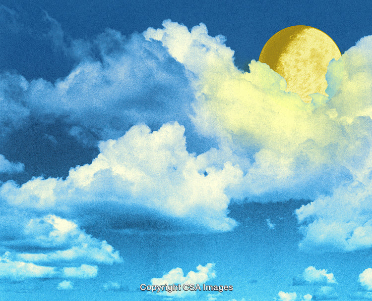 Bright Daytime Sky Featuring Sunlit Clouds and Blue Background