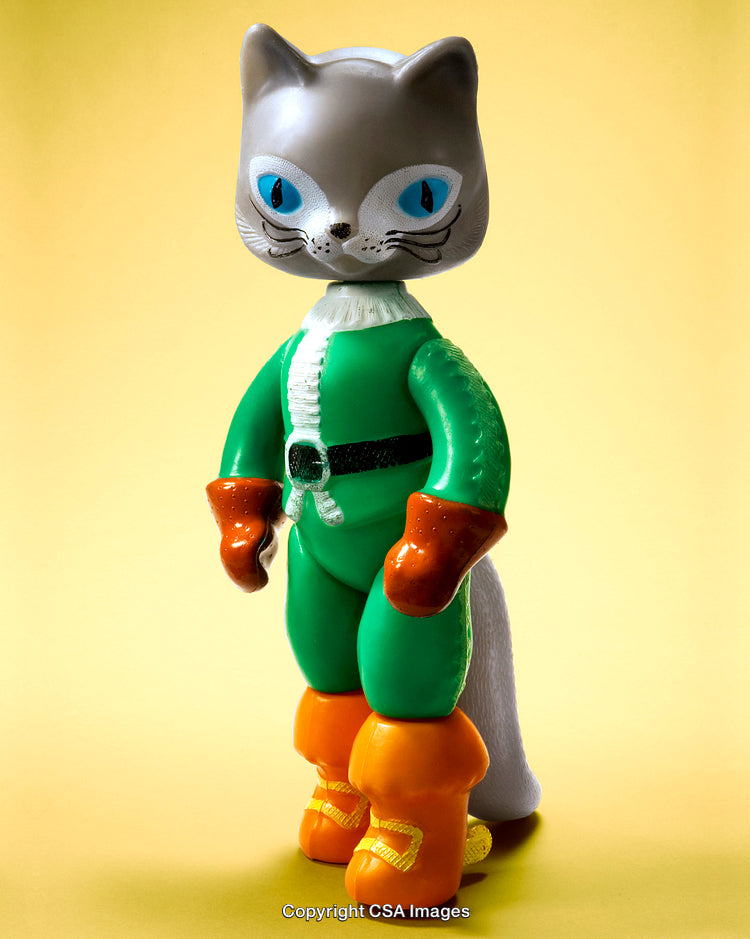Colorful Plastic Toy Figure of a Cat in a Superhero Costume