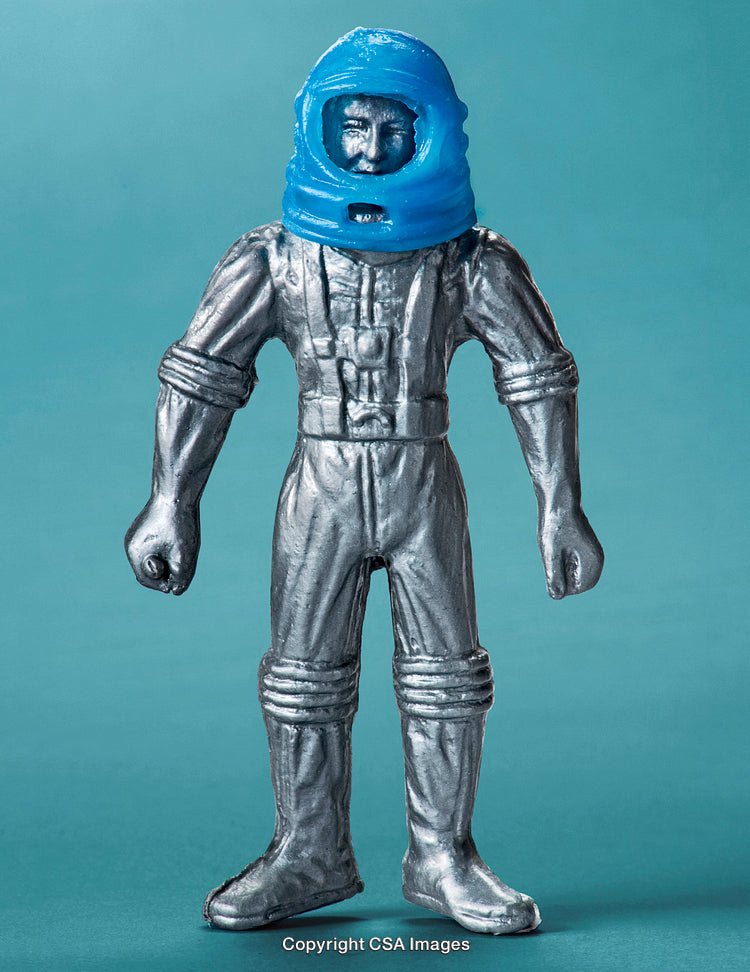 Silver Space Explorer Figure with Blue Helmet on Teal Background