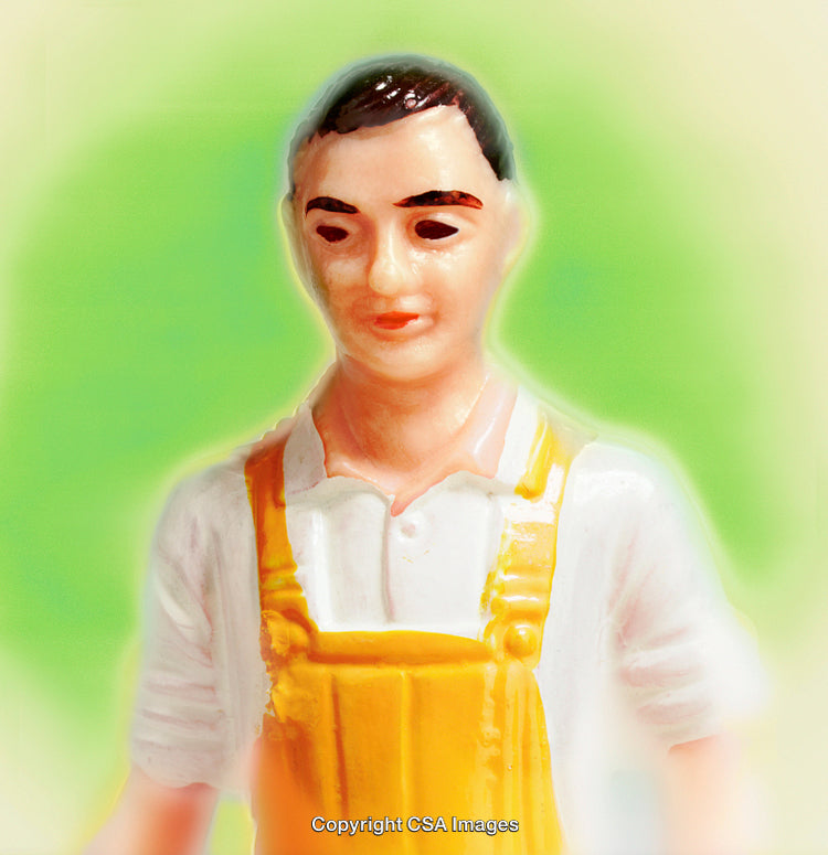 Close-Up of Toy Figurine in Bright Green and Yellow