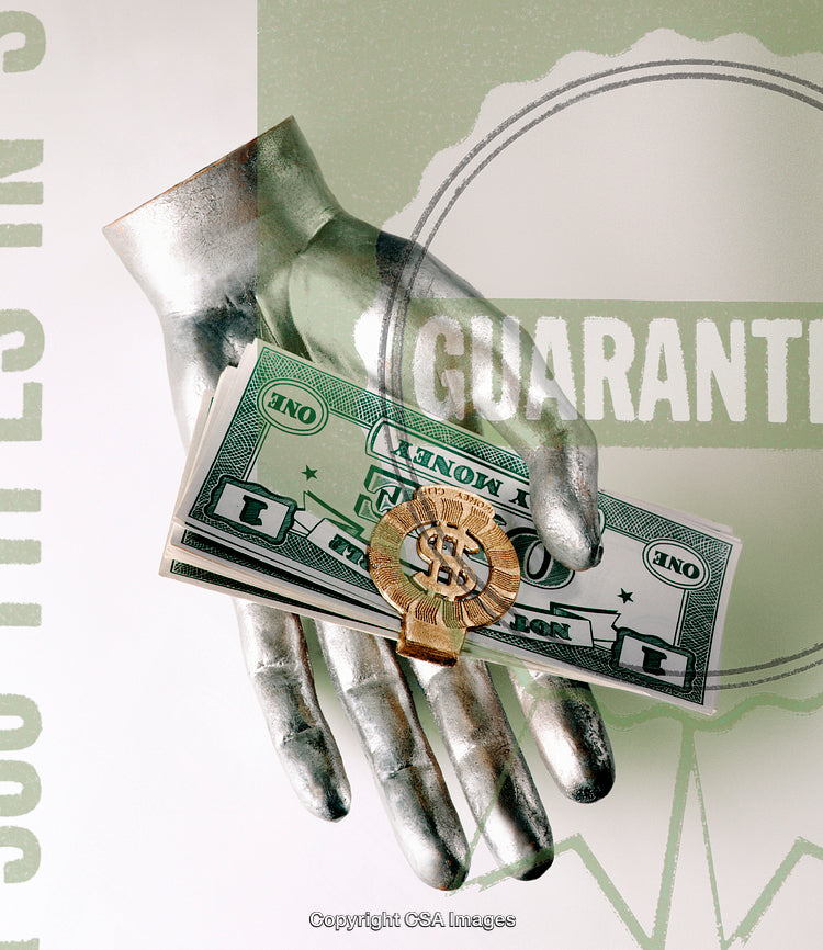 Silver Hand Holding Money Concept with Guaranteed Symbol Displayed