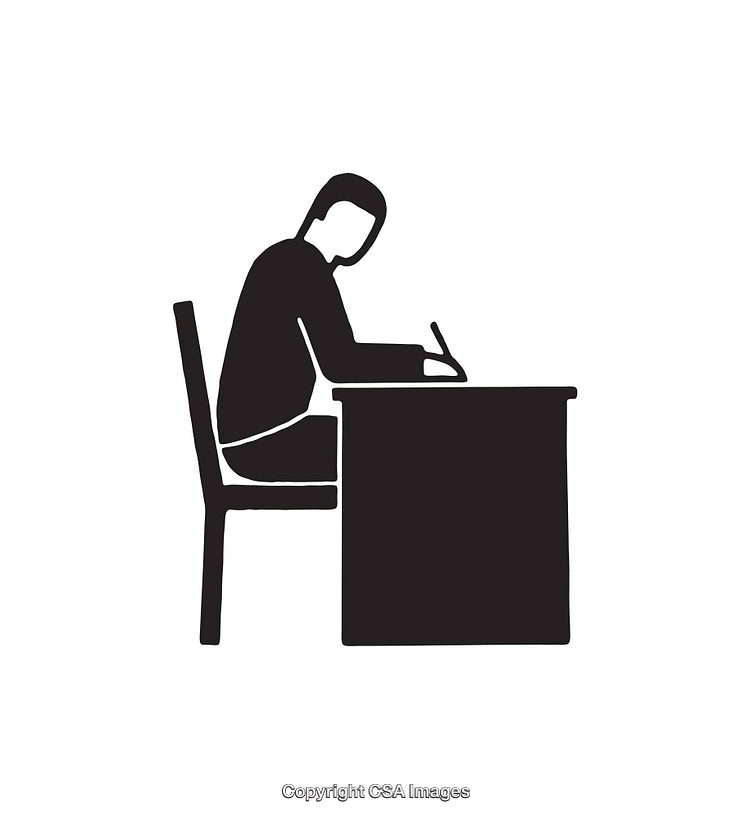 Silhouette of a Person Writing at a Desk in Black and White