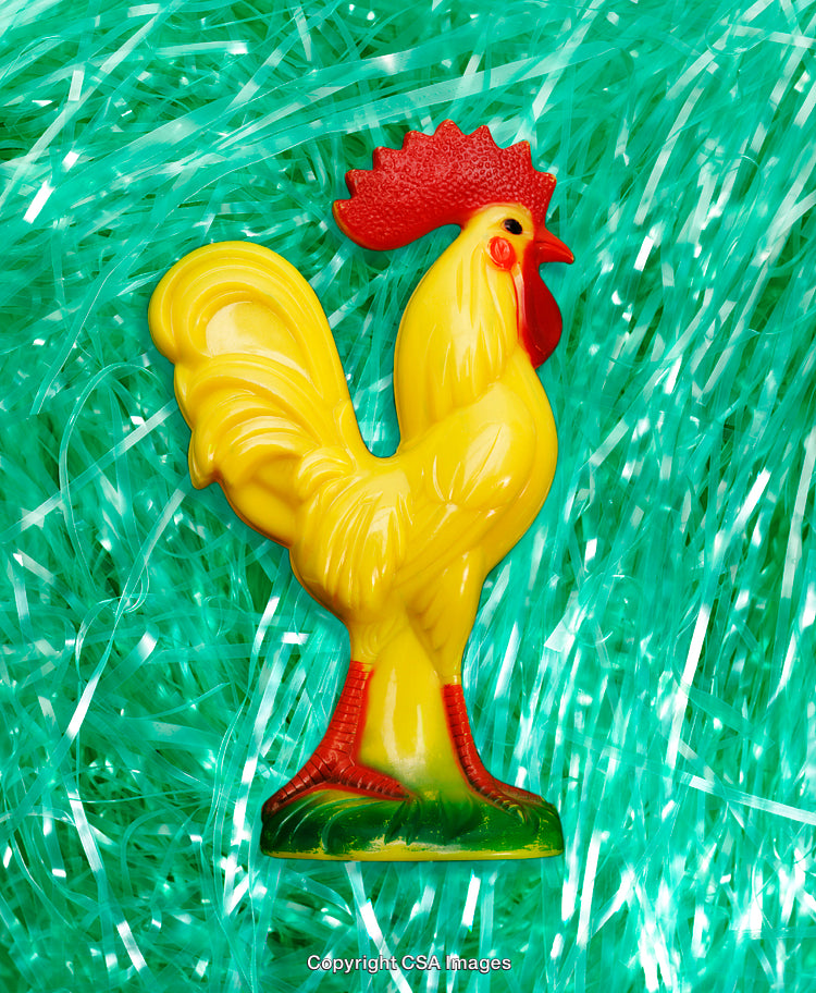 Colorful Plastic Rooster Toy On Bright Blue Decorative Background