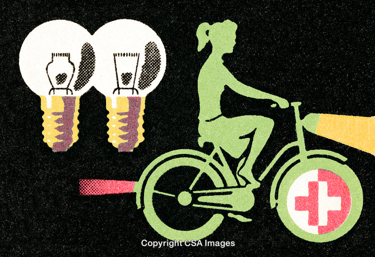 Creative Energy Concept Depicting a Bicyclist Powering a Light Bulb
